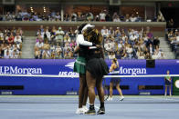 Serena Williams, right, and Venus Williams, of the United States, embrace after a loss in their first-round doubles match against Lucie Hradecká and Linda Nosková, of the Czech Republic, at the U.S. Open tennis championships, Thursday, Sept. 1, 2022, in New York. (AP Photo/Charles Krupa)