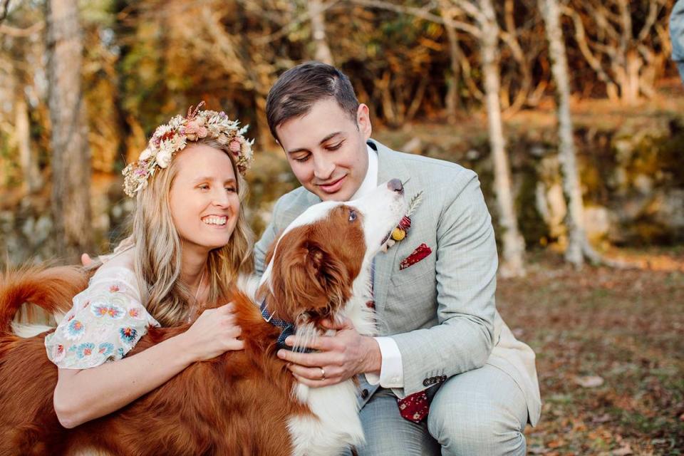 Blaze, now a 4-year-old English Shepherd, with his owners, Meredith and David Miller.