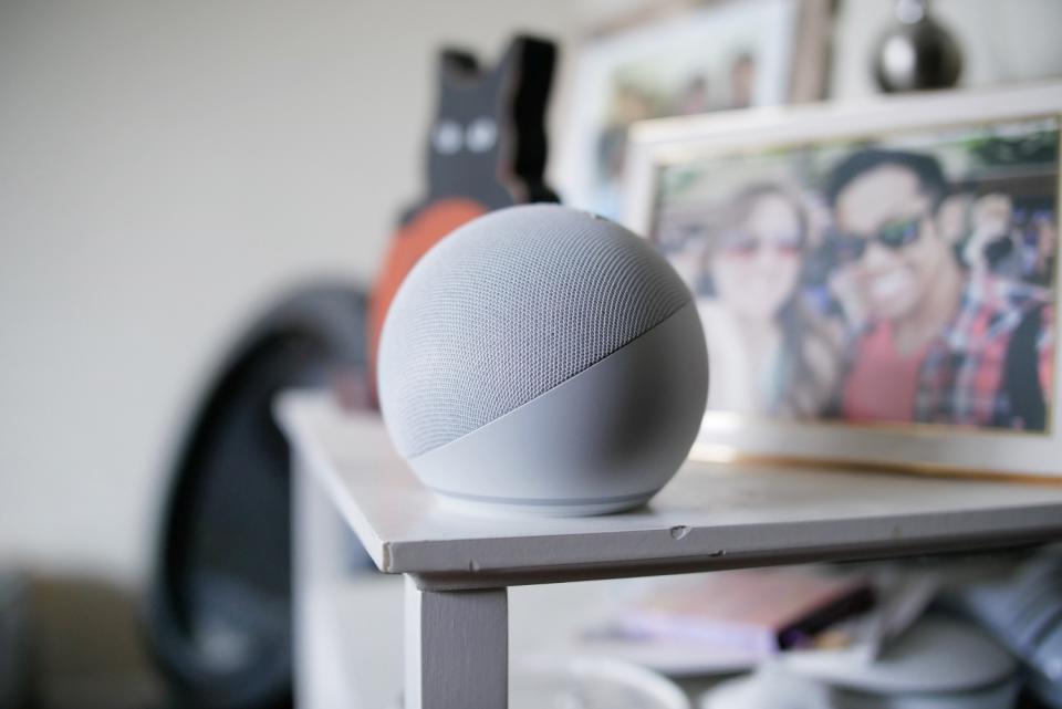 Amazon Echo Dot (5th Gen) sitting on edge of desk