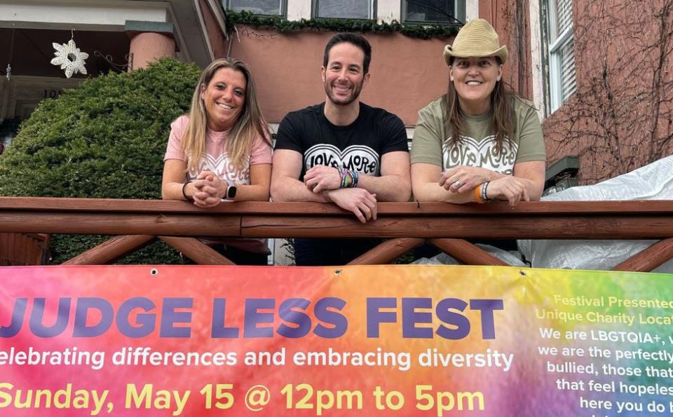 The staff of Love More Judge Less outside their Main Street location, just down the road from Grace Lord Park, where they will host the first Judge Less Festival at Grace Lord Park in Boonton: from left, director Elaina Bilotti, assistant Michael Bucceri and founder Vicki Duffy.