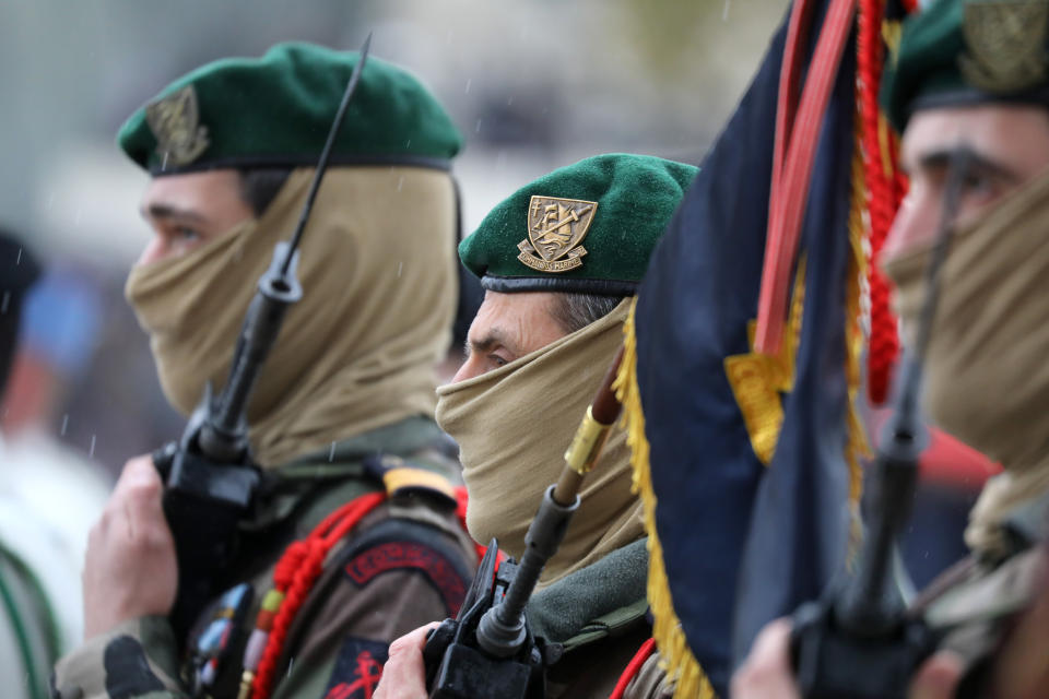 Soldiers of the "Commandos Marine" special force attend a ceremony at the Arc de Triomphe during commemorations marking the 101st anniversary of the 1918 armistice, ending World War I, Monday Nov. 11, 2019 in Paris . (Ludovic Marin/Pool via AP)