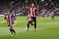 Sheffield United's Ben Brereton Diaz celebrates scoring the first goal of the game, during the English Premier League soccer match between Sheffield United and Nottingham Forest, at Bramall Lane, in Sheffield, England, Saturday May 4, 2024. (Danny Lawson/PA via AP)