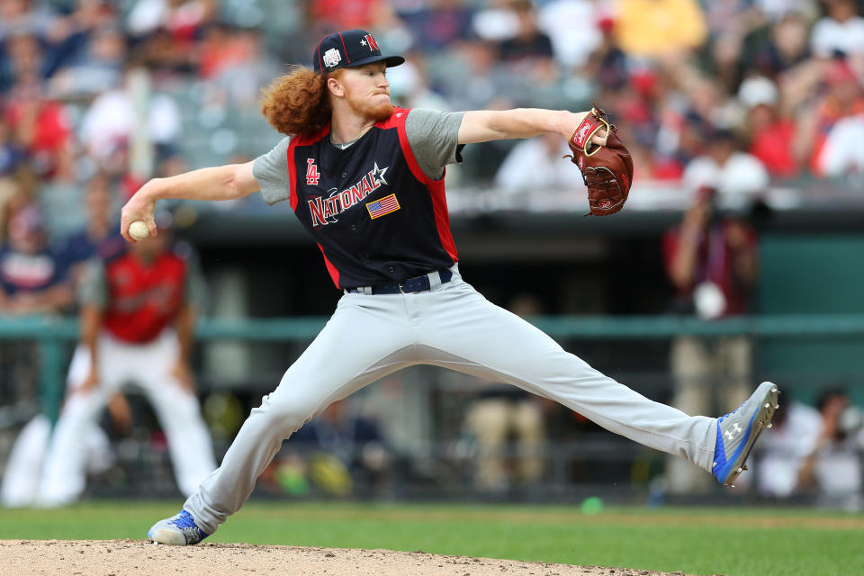 CLEVELAND, OH - JULY 07:  Dustin May #12 of the National League Futures Team pitches during the SiriusXM All-Star Futures Game at Progressive Field on Sunday, July 7, 2019 in Cleveland, Ohio. (Photo by Rob Tringali/MLB Photos via Getty Images)