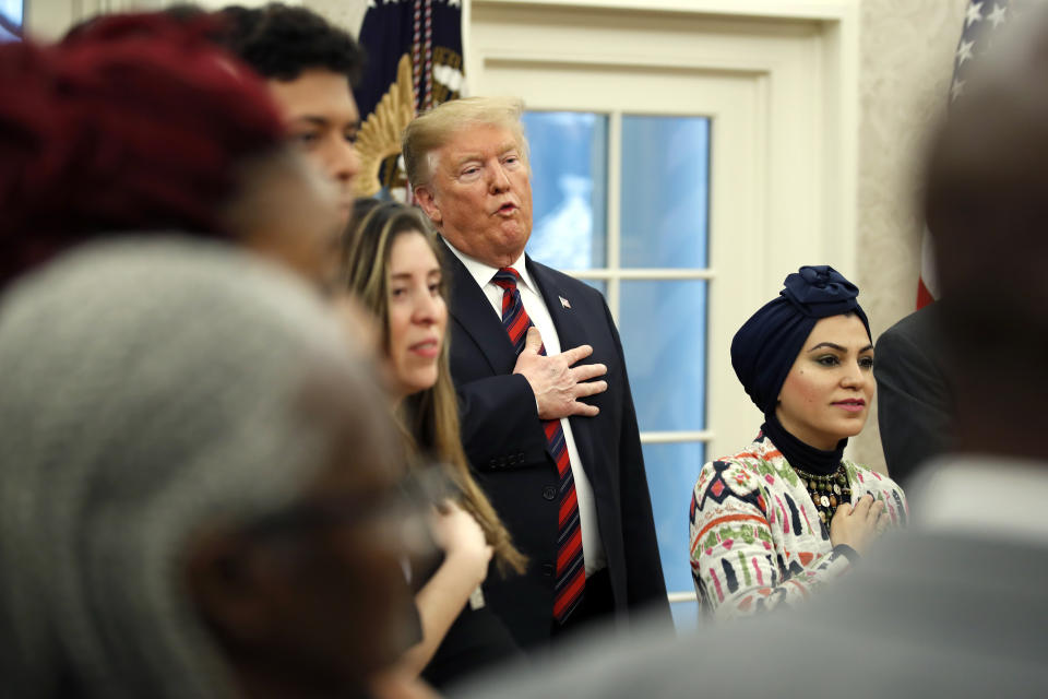 President Donald Trump attends a naturalization ceremony in the Oval Office of the White House, in Washington, Saturday, Jan. 19, 2019. (AP Photo/Alex Brandon)