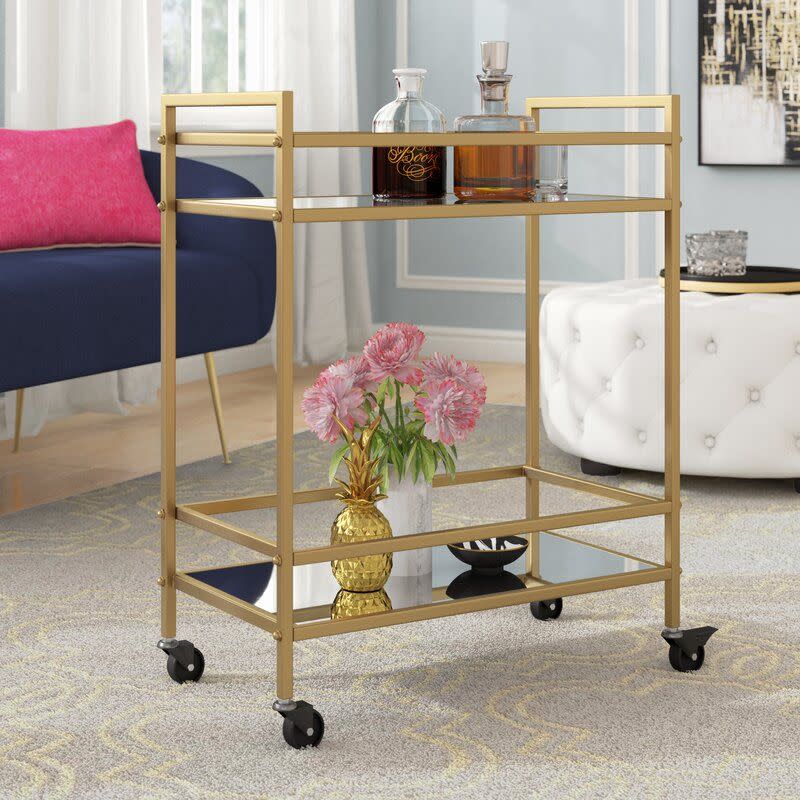 <p><a href="https://go.redirectingat.com?id=74968X1596630&url=https%3A%2F%2Fwww.wayfair.com%2Ffurniture%2Fpdp%2Fmercer41-chicago-bar-cart-w004778935.html&sref=https%3A%2F%2Fwww.cosmopolitan.com%2Flifestyle%2Fadvice%2Fa61780%2Feasy-ways-to-freshen-room%2F" rel="nofollow noopener" target="_blank" data-ylk="slk:Shop Now;elm:context_link;itc:0;sec:content-canvas" class="link ">Shop Now</a></p><p>Chicago Bar Cart</p><p>$189.99</p><p>wayfair.com</p>