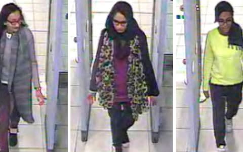 Kadiza Sultana, left, Shamima Begum, center, and Amira Abase going through security at Gatwick airport - Credit: Metropolitan Police