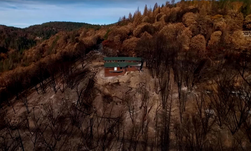 An aerial photo shows Sean Jennings' home surrounded by scorched land after a 2015 wildfire in northern California.<span class="copyright">Courtesy Sean Jennings</span>