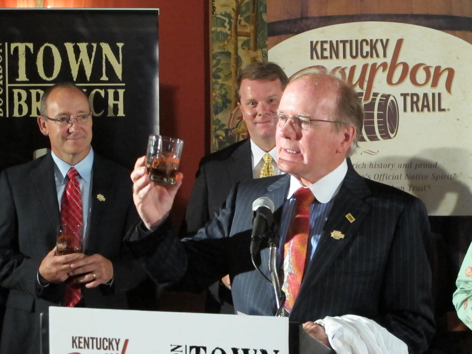 Alltech President Pearse Lyons raises his glass to offer a toast on Thursday, Aug. 16, 2012, in Lexington, Ky., as Alltech’s Lexington Brewing & Distilling Co. joins the Kentucky Bourbon Trail. The trail featuring seven distilleries has become a popular tourist attraction in Kentucky. (AP Photo/Bruce Schreiner)