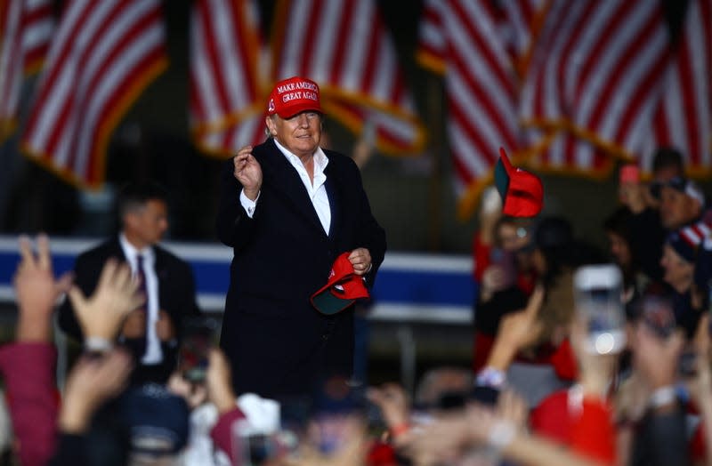 Former President Donald J. Trump takes the stage at his Save America rally in Florence, Ariz. on Saturday, Jan. 15, 2022.