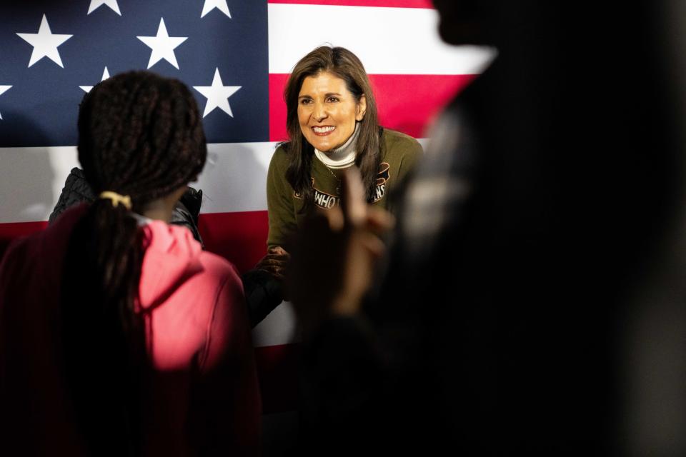 Former U.N. Ambassador Nikki Haley greets a young supporter during a meet and greet afer her event Saturday, Jan. 13, 2024, at The James Theater in Iowa City.