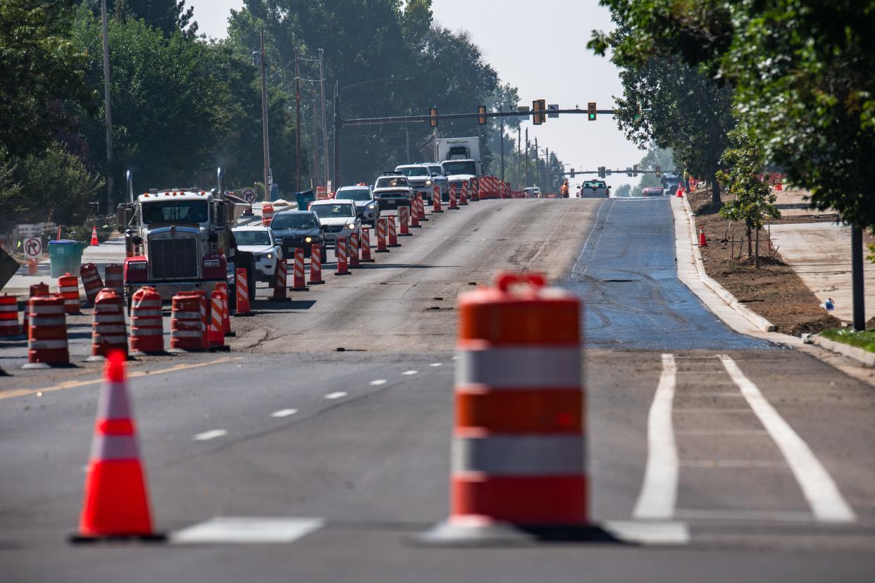 Northbound cars travel as southbound Timberline Road is closed between Harmony and Trilby on Wednesday in Fort Collins for a project to widen Timberline to four lanes and build a pedestrian underpass under Timberline.