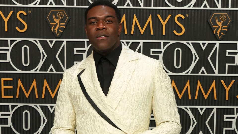 “Ted Lasso” actor Sam Richardson was in Grayscale, wearing a double-breasted custard cream blazer with black lapel accent, shirt, pants and patent leather shoes. - Jordan Strauss/Invision/AP