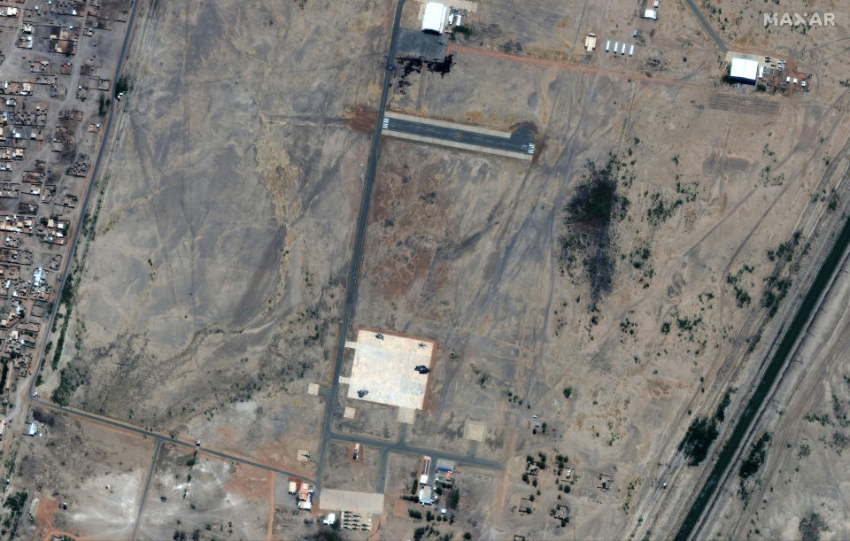 This satellite image provided by Maxar Technologies shows an overview of a helicopter base in south Khartoum, Sudan, Tuesday April 18, 2023. (Satellite image ©2023 Maxar Technologies via AP)