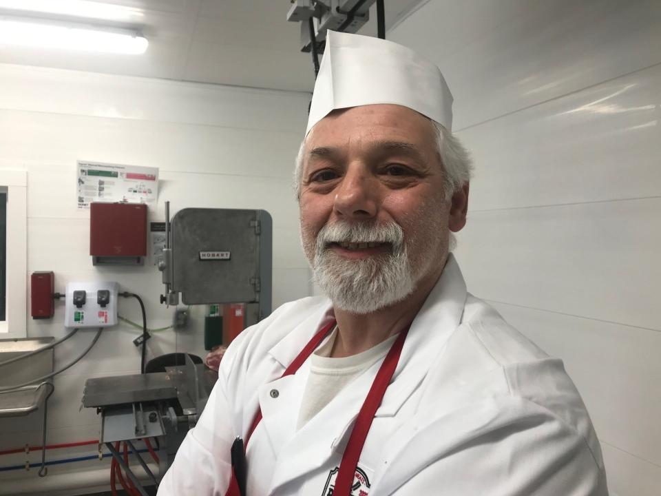 Todd Ashine is the butcher at the Butcher Barn in Westford, as seen on Feb. 1, 2021.