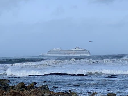 FILE PHOTO: A cruise ship Viking Sky drifts towards land after an engine failure, Hustadvika, Norway March 23, 2019. Odd Roar Lange/NTB Scanpix/via REUTERS/File Photo