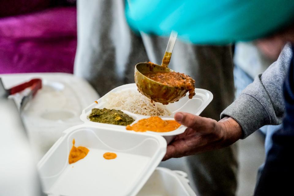 Daljit Singh celebrates the Sikh holiday of Vaisakhi by giving out free Vegetarian meals to all on Thursday, April 14, 2022, at India Palace, 4213 Lafayette Rd., Indianapolis. Vaisakhi, celebrated on April 13th, or 14th, is a celebration of spring harvest primarily in Punjab, but it is also considered by some to be the Indian Solar New Year.