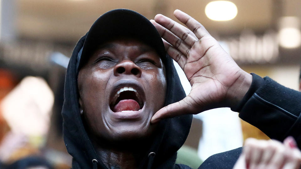 Seen here, Israel Adesanya was part of a George Floyd protest rally in Auckland.