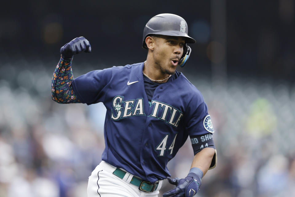 Seattle Mariners' Julio Rodriguez pumps his fist as he runs the bases after hitting a solo home run on a pitch from Detroit Tigers starting pitcher Tyler Alexander during the first inning of a baseball game, Wednesday, Oct. 5, 2022, in Seattle. (AP Photo/John Froschauer)