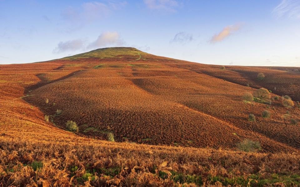 Sugar loaf mountain at Abergavenny in South Wales - Getty