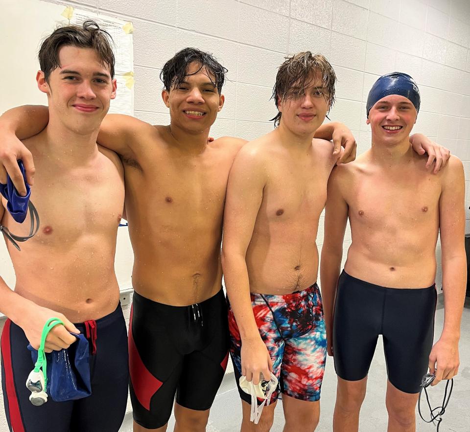 The Owen Valley boys' medley relay team of Sawyer LaGrange, Jose Manzano, Aidan Christy and Tucker McCarty, poses for a photo a the Greencastle meet.