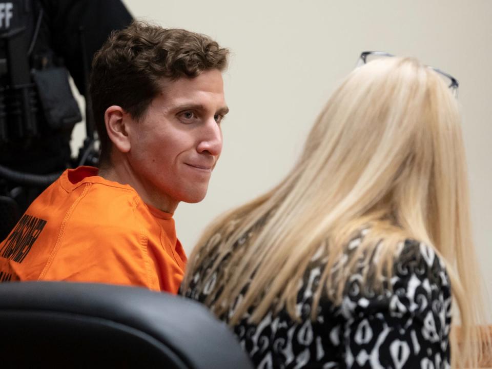 Bryan Kohberger, left, who is accused of killing four University of Idaho students in November 2022, looks toward his attorney, public defender Anne Taylor, right, during a hearing in Latah County District Court on Thursday (AP)