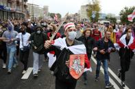 Belarusian opposition supporters hold a rally in Minsk