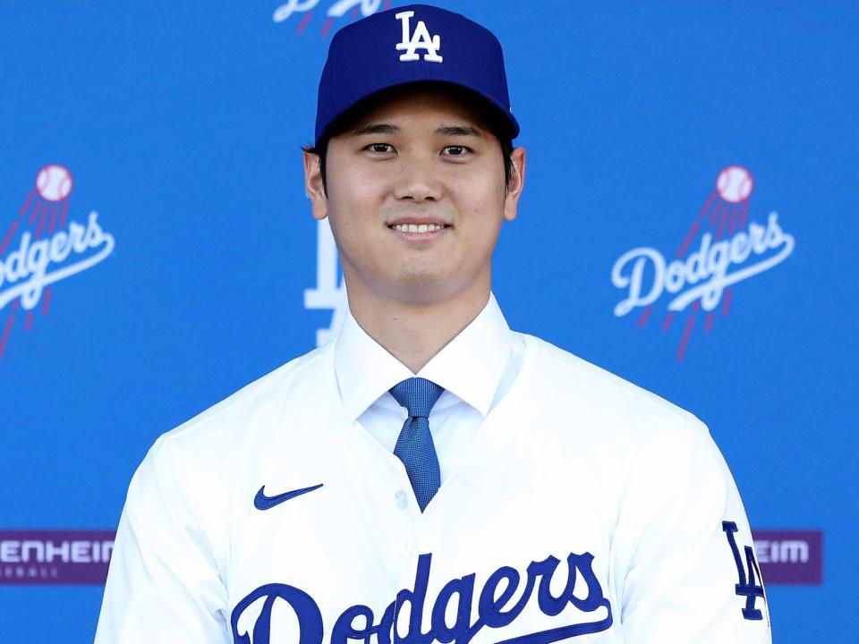 <p>Meg Oliphant/Getty</p> Shohei Ohtani is introduced by the Los Angeles Dodgers at Dodger Stadium on December 14, 2023 in Los Angeles, California