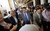 India's Commerce Minister Anand Sharma (C) arrives at the ninth World Trade Organization (WTO) Ministerial Conference in Nusa Dua, on the Indonesian resort island of Bali December 6, 2013. REUTERS/Edgar Su