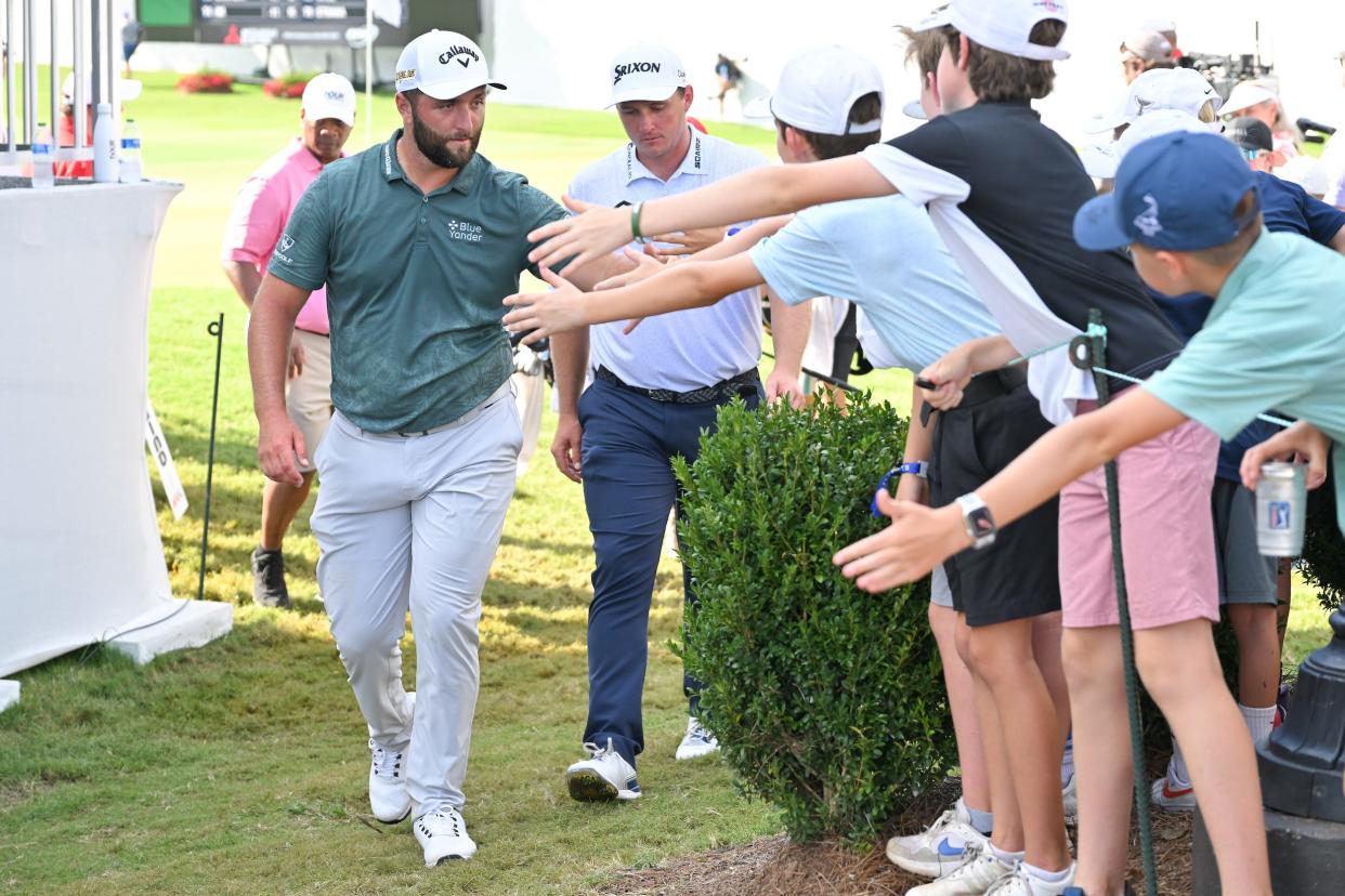 Masters champions Jon Rahm.