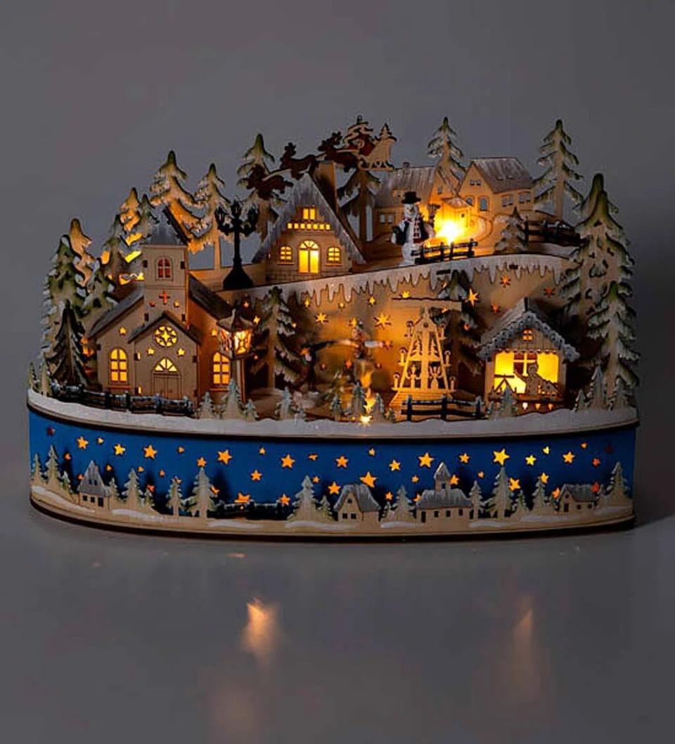 <p><a href="https://go.redirectingat.com?id=74968X1596630&url=https%3A%2F%2Fwww.wayfair.com%2Fholiday-decor%2Fpdp%2Fwind-weather-christmas-snow-town-lighted-holiday-tabletop-music-box-xbvn2399.html&sref=https%3A%2F%2Fwww.housebeautiful.com%2Fentertaining%2Fholidays-celebrations%2Fg45836744%2Fbeautiful-christmas-village-sets%2F" rel="nofollow noopener" target="_blank" data-ylk="slk:Shop Now;elm:context_link;itc:0;sec:content-canvas" class="link ">Shop Now</a></p><p>Christmas Village</p><p>wayfair.com</p><p>$94.46</p>