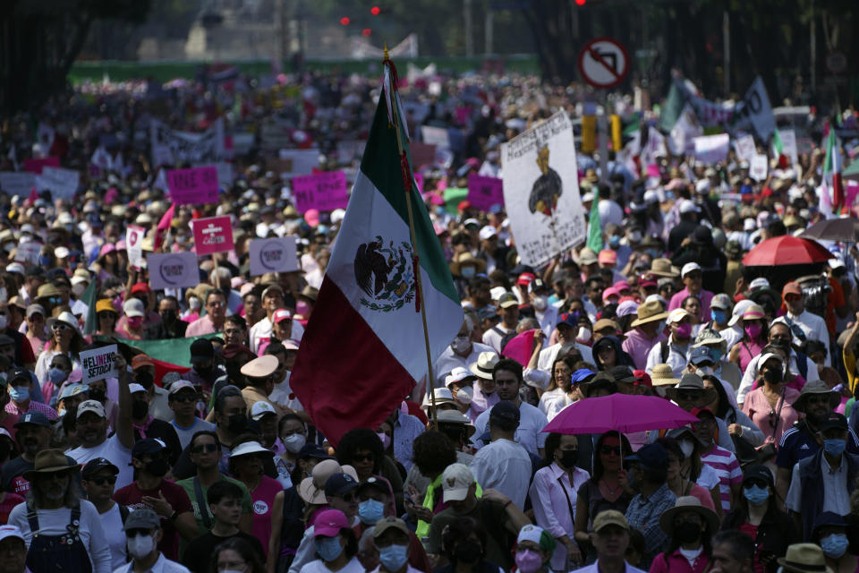 Citizen organizations march in support of Mexico's National Elections Institute as President Andrés Manuel López Obrador pushes to reform it, in Mexico City, Sunday, Nov. 13, 2022. (AP Photo/Marco Ugarte)