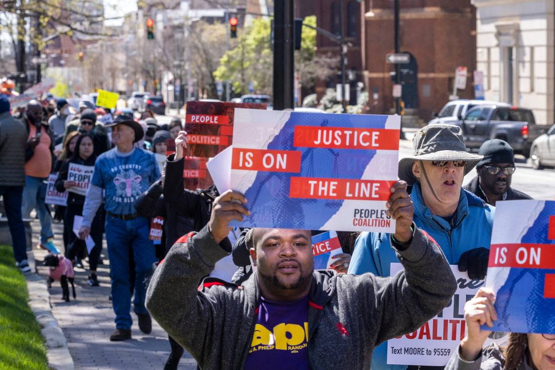 Voting rights activists march from the state Capitol to the NC Legislative Building Tuesday, March 14, 2022 as as the NC Supreme Court revisited the question of whether partisan gerrymandering is forbidden under the state constitution.