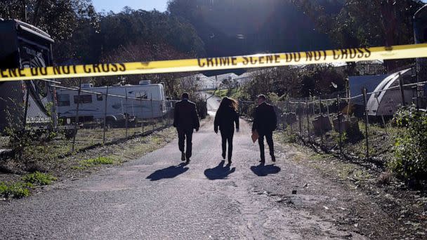 PHOTO: FBI officials walk towards from the crime scene at Mountain Mushroom Farm, Jan. 24, 2023, after a gunman killed several people at two agricultural businesses in Half Moon Bay, Calif. (Aaron Kehoe/AP)