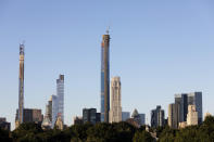 The Central Park Tower, center, is under construction, Tuesday, Sept. 17, 2019 in New York. At 1550 feet (472 meters) the tower is the world's tallest residential apartment building, according to the developer, Extell Development Co. (AP Photo/Mark Lennihan)