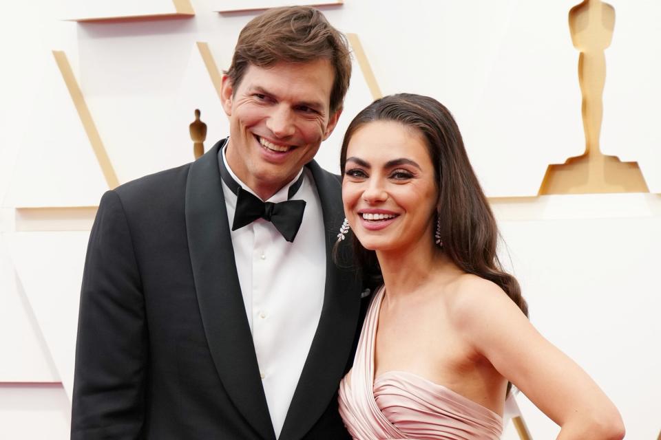 Ashton Kutcher and Mila Kunis attend the 94th Annual Academy Awards at Hollywood and Highland on March 27, 2022 in Hollywood, California.