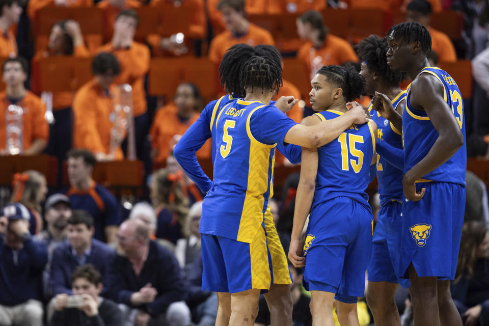 Pittsburgh's Jaland Lowe (15) looks out from a huddle during the first half of the team's NCAA college basketball game against Virginia on Tuesday, Feb. 13, 2024, in Charlottesville, Va. (AP Photo/Mike Kropf)