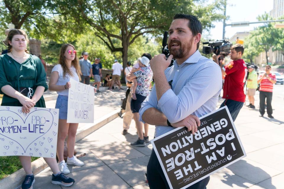 John Seago, president of Texas Right to Life, speaks to a group of anti-abortion activists gathered Saturday outside the Capitol. He said his organization will join with other advocacy groups to provide support to women who find themselves with an unplanned pregnancy.