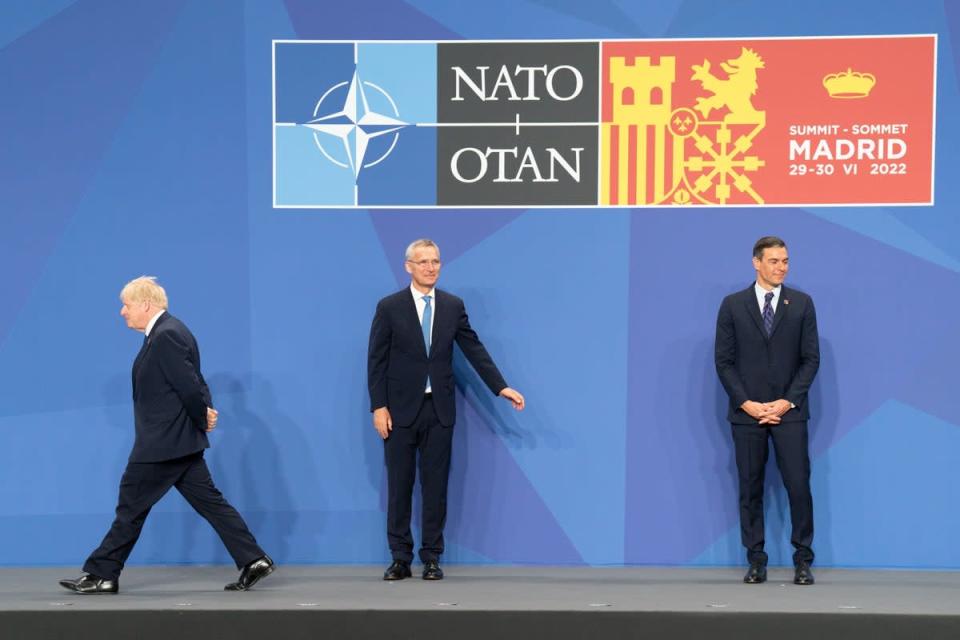 Nato secretary general Jens Stoltenberg, and Spanish prime minister Pedro Sanchez welcome Prime Minister Boris Johnson to the Nato summit in Madrid, Spain (Stefan Rousseau/PA) (PA Wire)