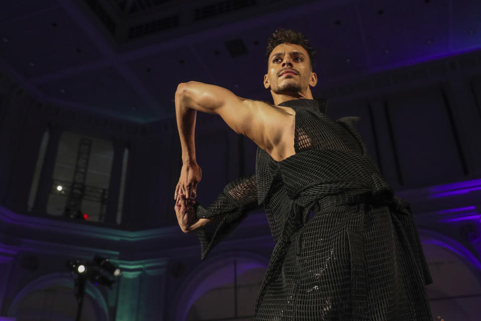 The Landeros New York collection is modeled during the dapperQ fashion show at the Brooklyn Museum on Thursday, Sept. 5, 2019, in New York. (AP Photo/Jeenah Moon)