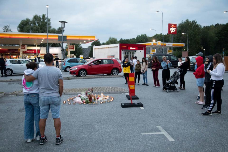 People laid floral tributes and candles in memory of the child (via REUTERS)