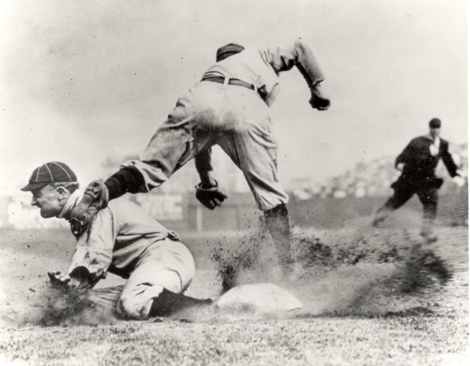 Ty Cobb slides into third base vs. the New York Highlanders at Hilltop Grounds in New York in 1910.