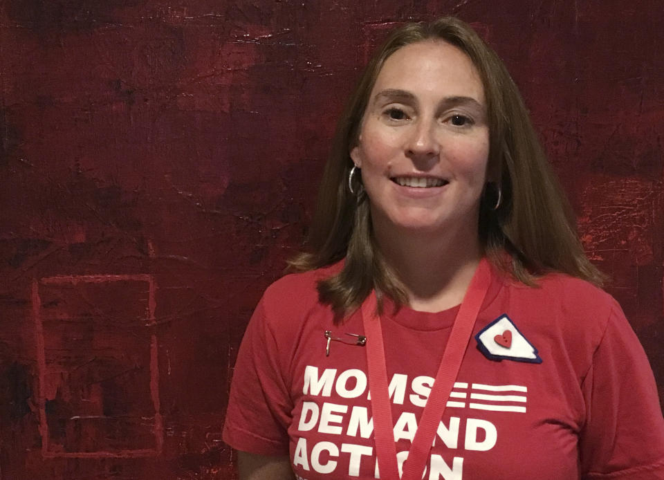 Elizabeth Becker poses for a photo Friday, Aug. 10, 2018, during Gun Sense University, a two-day conference in Atlanta put on by gun safety advocacy group Moms Demand Action for Gun Sense in America. The group is encouraging its volunteers to take their activism to the next level by running for office. Becker, who helped get a successful background check initiative onto the ballot in Nevada in 2016, is considering a run for public office. (AP Photo/Kate Brumback)