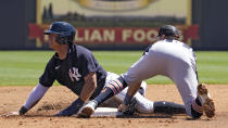 New York Yankees' Anthony Volpe, left, steals second base against Detroit Tigers shortstop Ryan Kreidler during the second inning of a spring training baseball game Tuesday, March 21, 2023, in Tampa, Fla. (AP Photo/Chris O'Meara)