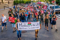 <p>The Socialist Feminists of Democratic Socialists of America (DSA) organized a protest outside of the New York County Republican Office in New York City on July 5, 2017 to tell Republicans that is it despicable and undemocratic that they are trying to ram Trumpcare through the Senate without debate or public hearings. (Photo: Erik McGregor/Pacific Press/LightRocket via Getty Images) </p>