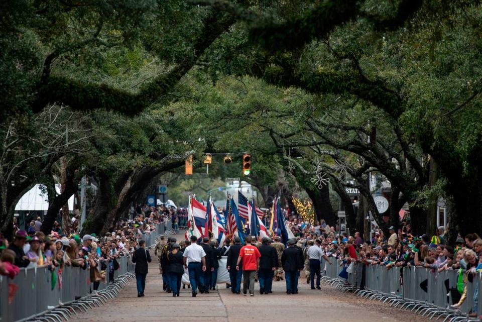 Military members carry flags of different states during The Ocean Springs Elks Carnival Parade in downtown Ocean Springs on Saturday, Jan. 27, 2024. Hannah Ruhoff/Sun Herald