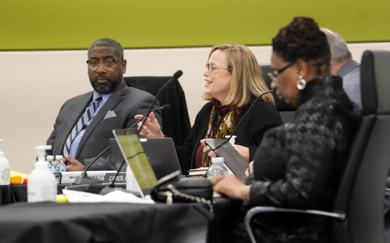 Jan 17, 2023; Columbus, Ohio, United States; Board member Carol Beckerle makes a point as fellow board member Michael Cole listens during the Tuesday, January 17, 2023 Columbus City Schools board meeting. Mandatory Credit: Doral Chenoweth-The Columbus Dispatch