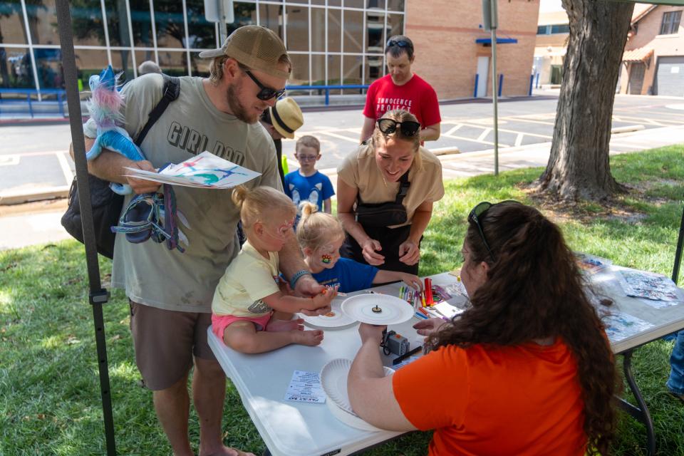 A young artists does a spiral drawing Aug. 12 at the Amarillo Museum of Art Family Day.