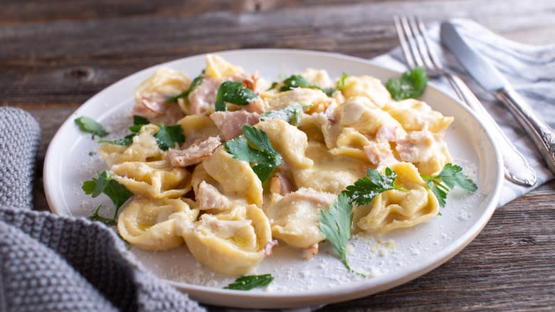 tortellini alla panna served on plate