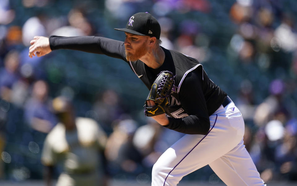 Colorado Rockies starting pitcher Jon Gray works against the San Diego Padres in the first inning of the first game of a baseball doubleheader Wednesday, May 12, 2021, in Denver. (AP Photo/David Zalubowski)