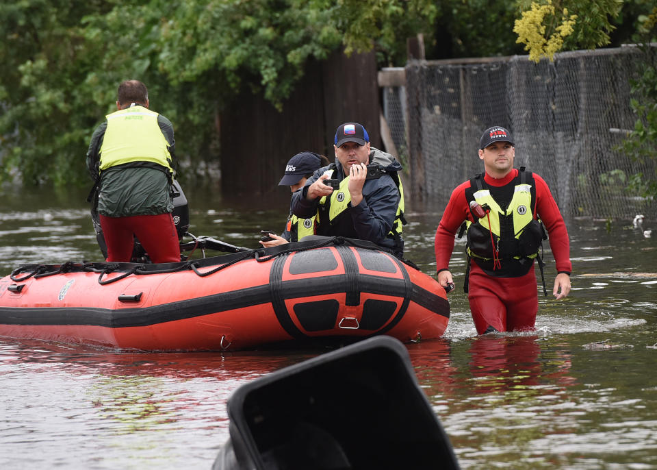 ORLANDO, FLORIDA, UNITED STATES - SEPTEMBER 29: Orange County Fire rescue unit members work in a flooded neighborhood in the aftermath of Hurricane Ian on September 29, 2022 in Orlando, Florida. The storm has caused widespread power outages and flash flooding in Central Florida as it crossed through the state after making landfall in the Fort Myers area as a Category 4 hurricane. (Photo by Paul Hennessy/Anadolu Agency via Getty Images)